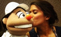 Asha de Vos meets a puppet of herself