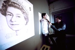 Liu Bolin turns friends into money, a solar cell from recycled car batteries, and fascinating looks at race in America