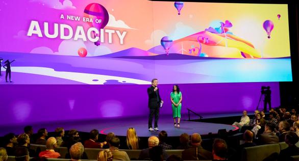 Chris Anderson and Anna Verghese speak at TED2022